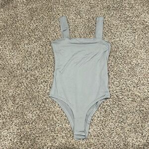 grey body suit